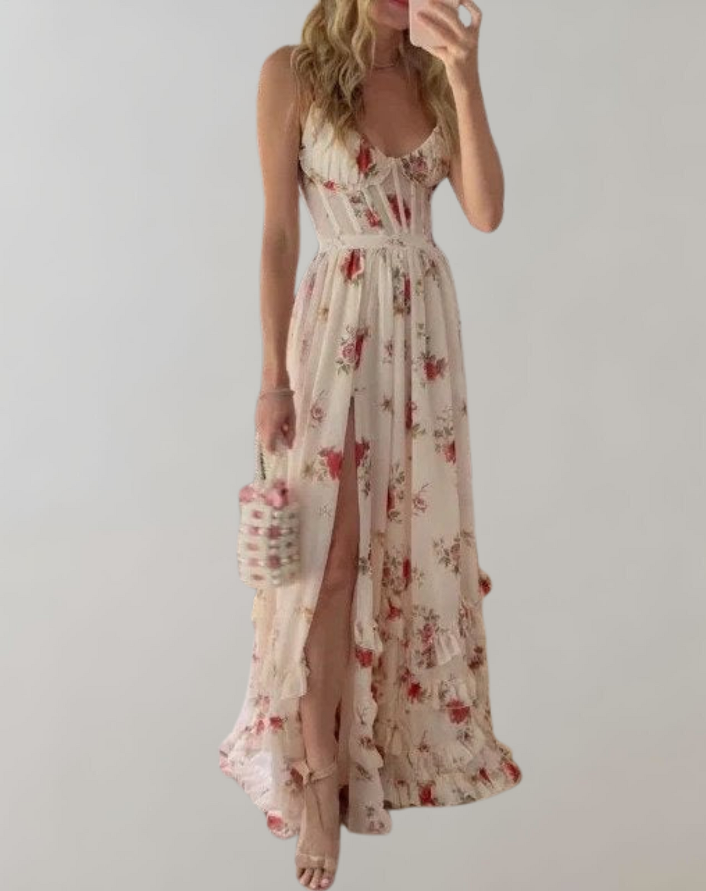 Elva - Mouwloos, getailleerd jurkje met bloemenprint en sexy beenuitsnijding