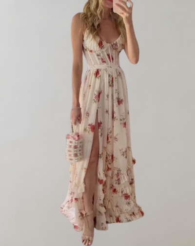 Elva - Mouwloos, getailleerd jurkje met bloemenprint en sexy beenuitsnijding