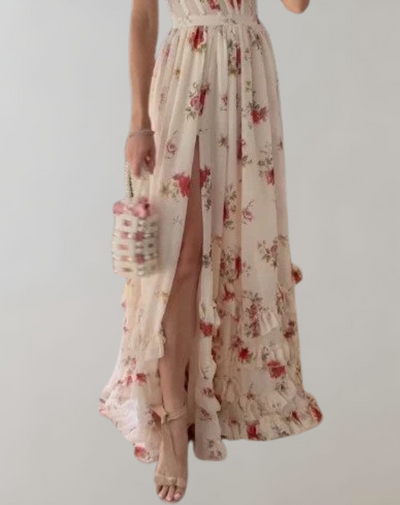 Elva - Mouwloos, getailleerd jurkje met bloemenprint en sexy beenuitsnijding