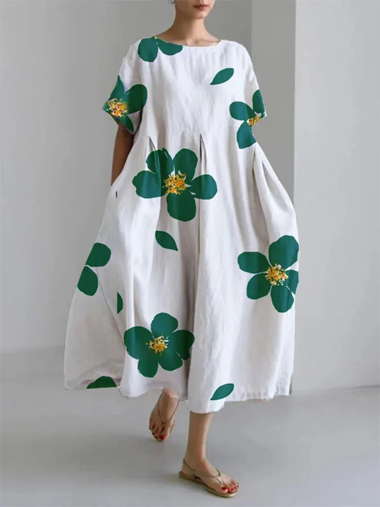 MIRA - LOSSE JURK MET FLORALE ACCENTEN